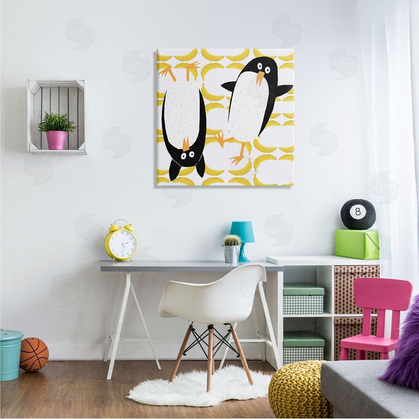 Stupell Industries Carla Daly | Kids' Arctic Penguin Pair Yellow Banana Pattern Wall Art