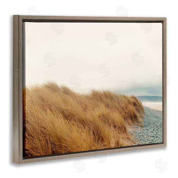 Stupell Industries Ian Winstanley | Tall Grass Windy Ocean Scene Pebble Coast Beach Wall Art
