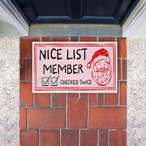 Stupell Industries JJ Design House LLC | Pink Nice List Ticket Non-Woven Door Mat
