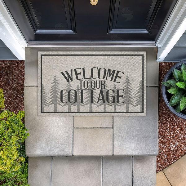 Stupell Industries Kim Allen | Welcome To Our Cottage Trees Faux Sisal Door Mat
