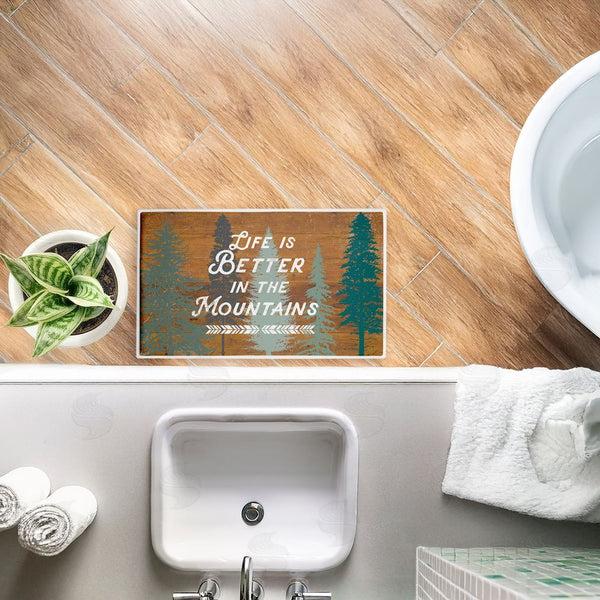 Stupell Industries Lula Bijoux & Co. | Retro Rustic Better In Mountains Plush Bath Mat