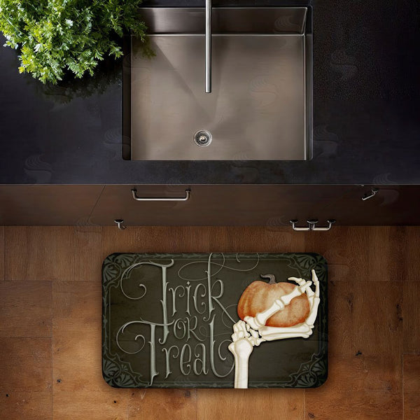 Stupell Industries Nicole Tamarin | Trick Or Treat Skeleton Hand Anti-Fatigue Mat