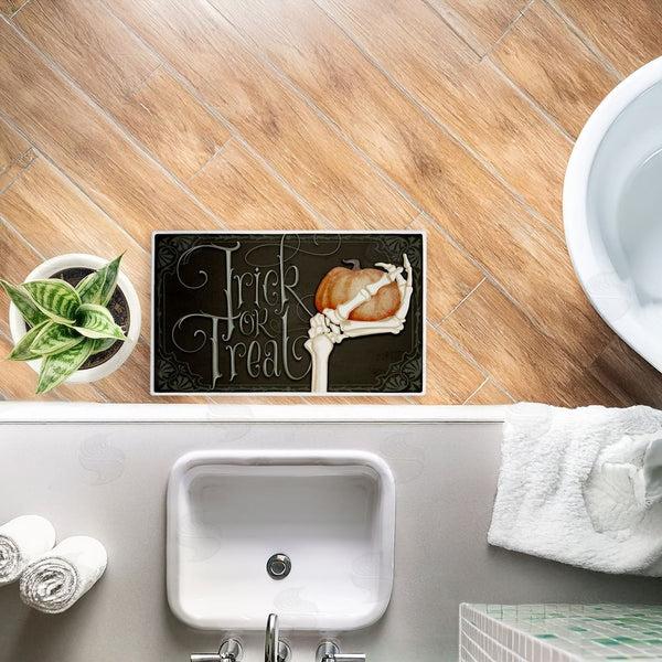 Stupell Industries Nicole Tamarin | Trick Or Treat Skeleton Hand Plush Bath Mat