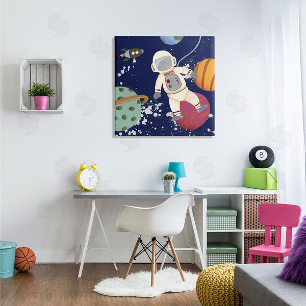 Stupell Industries Regina Moore | Playful Astronaut Floating In Space Planets Rocketship Wall Art