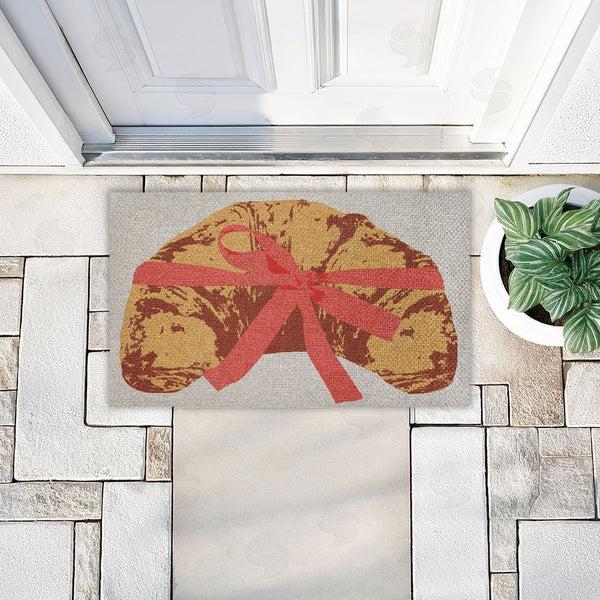 Stupell Industries Stupell Studio | Bakery Croissant With Ribbon Faux Sisal Door Mat